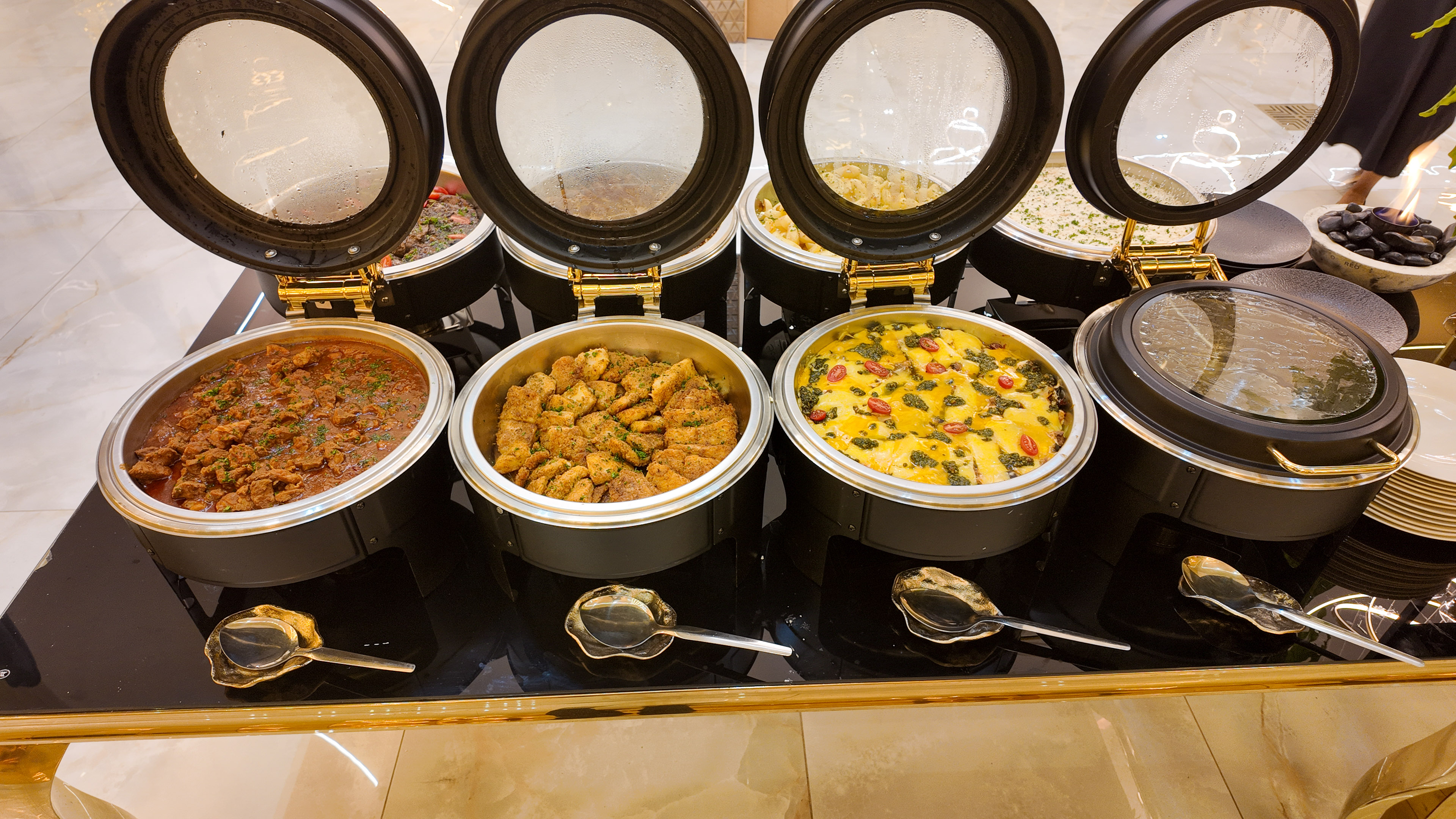 Premium wedding reception catering with elegant table arrangements